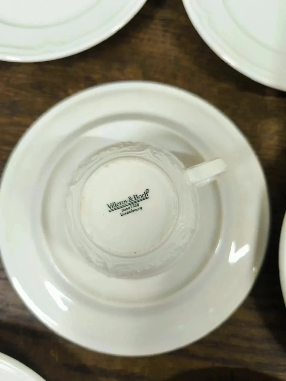 Set of 9 Villeroy and Boch Cortina mugs.