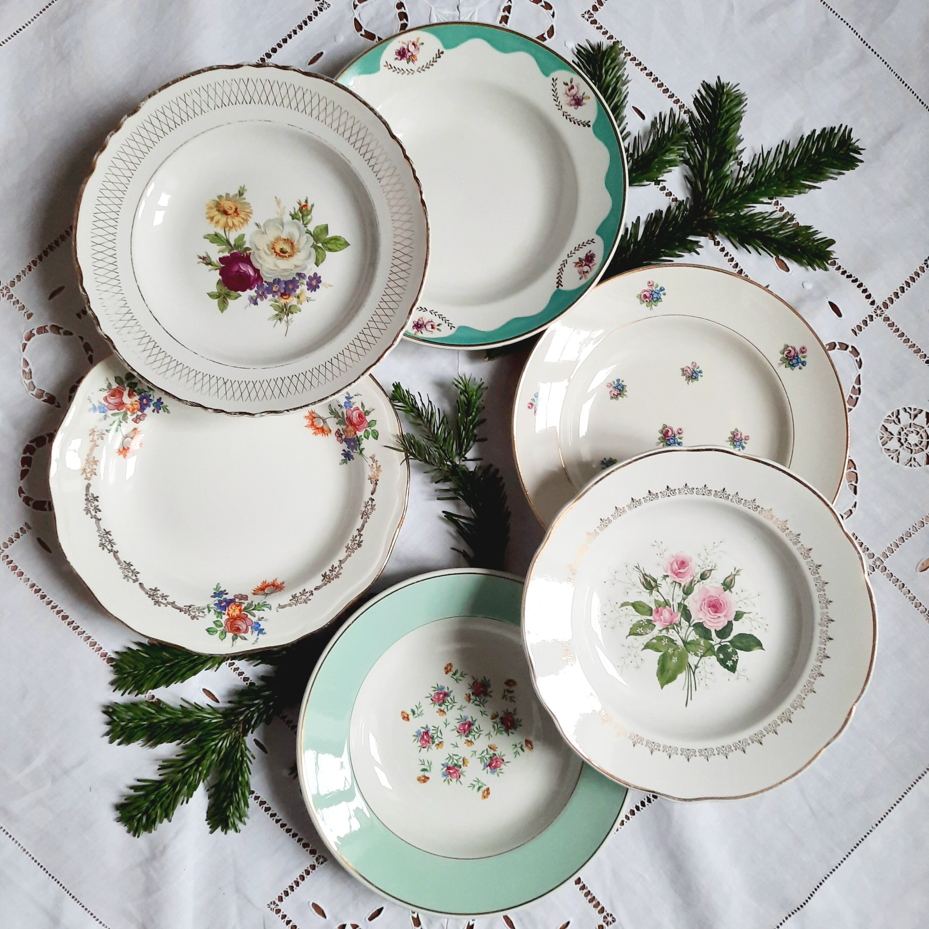 Old hollow plates mismatched in earthenware