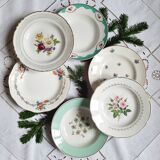 Old hollow plates mismatched in earthenware
