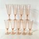 Flûtes à champagne en verre rose années 80