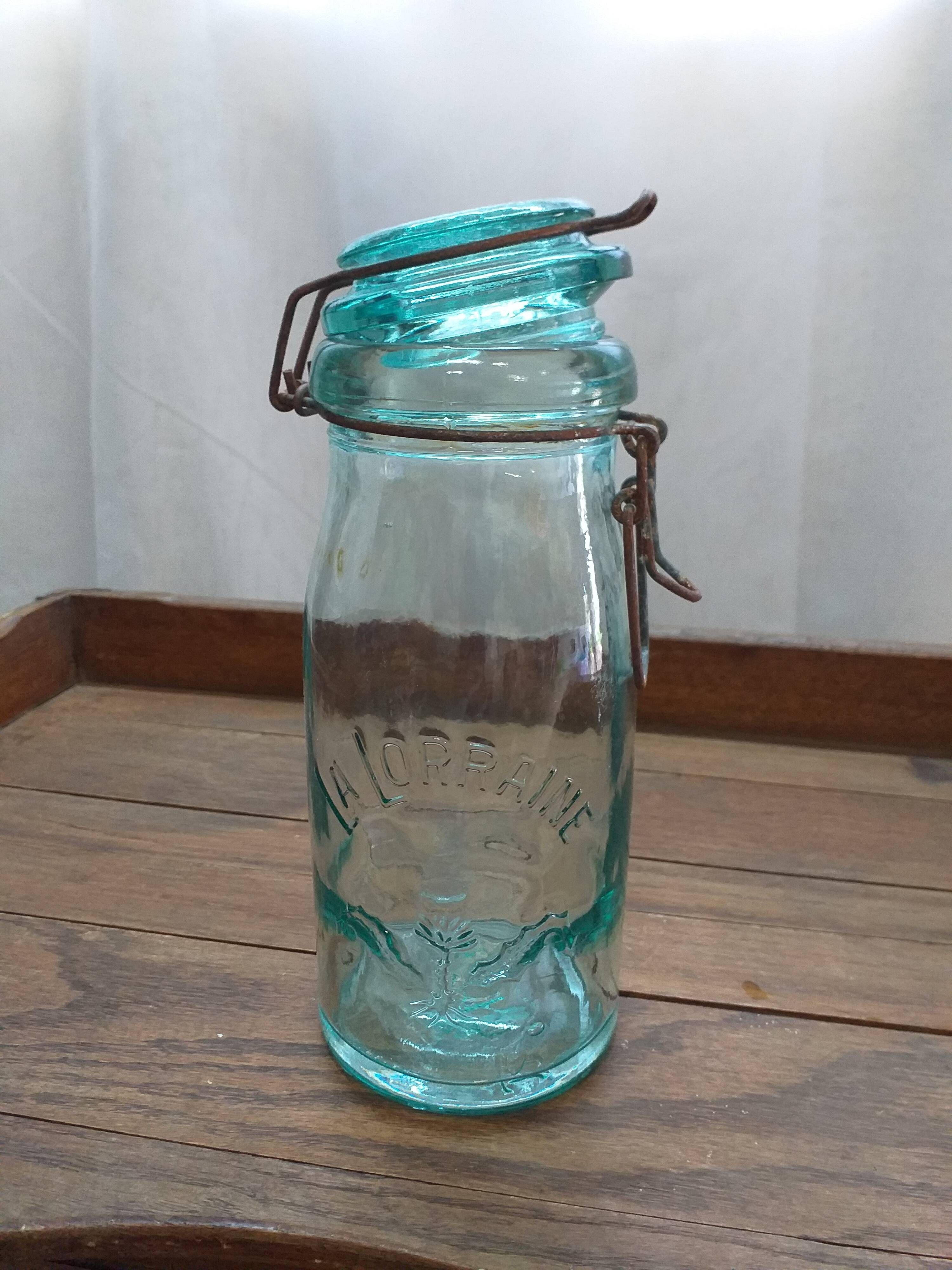Old jar La Lorraine and The ideal in thick glass light green and dark green
