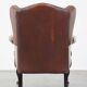 Brown leather wingback Chesterfield armchair