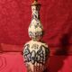 Antique ceramic lamp with brass or bronze base from the attic