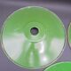 Trio of green suspensions in enamelled sheet metal
