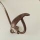 Antique steel wall-mounted coat rack