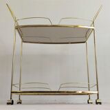 Serves golden trolley bar with wheels, in golden brass of the 80'S