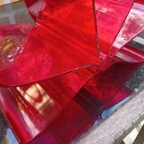 Kartell red magazine rack