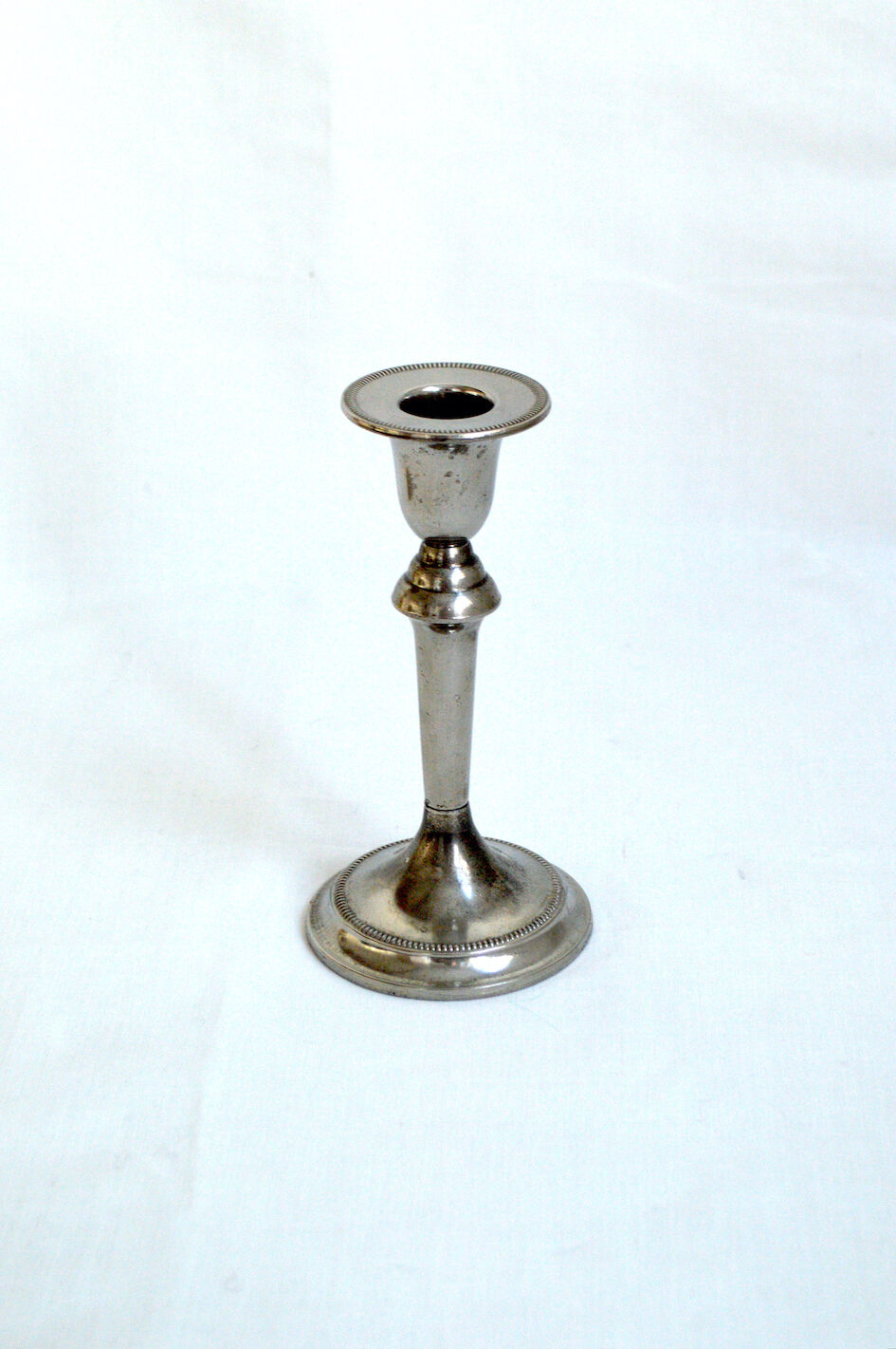 Silver candle holder
