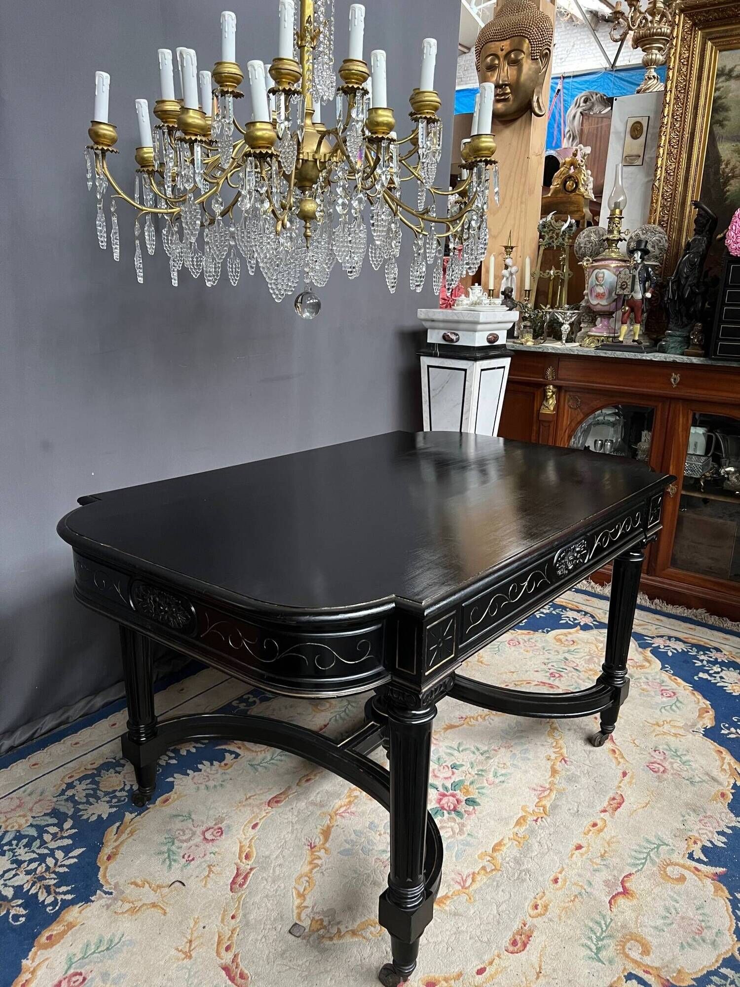 Dining room set consisting of a table and six chairs from the Napoleon III period.
