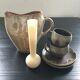 Beige stoneware pitcher with white drips