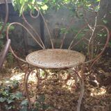 Duo of iron lawn chairs