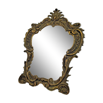 Victorian-baroque style beveled mirrored bronze table mirror.
