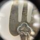 Set of 6 silver-plated oyster forks with 7 knot pattern filigree.