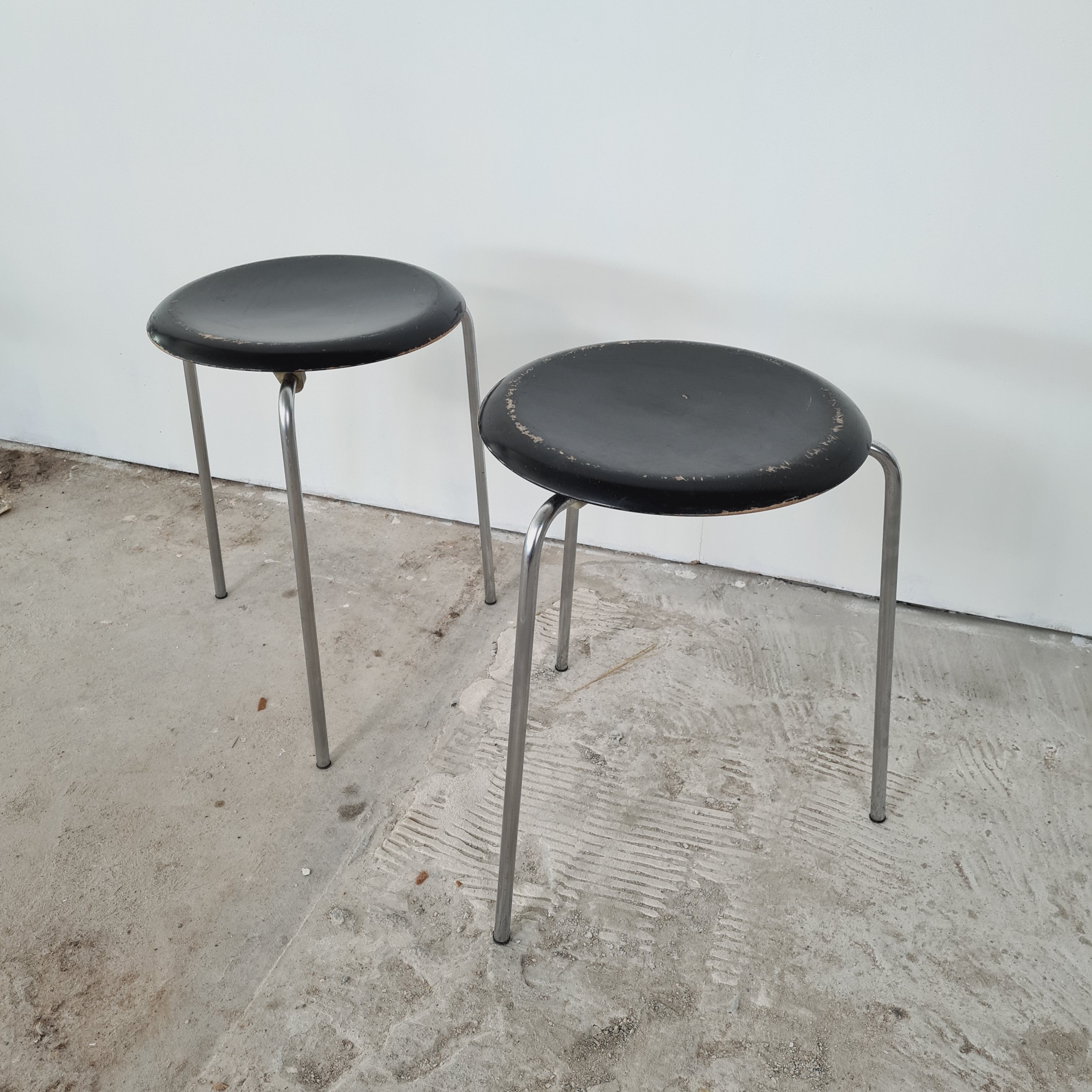 Set of two black "Dot" stools by Arne Jacobsen for Fritz Hansen