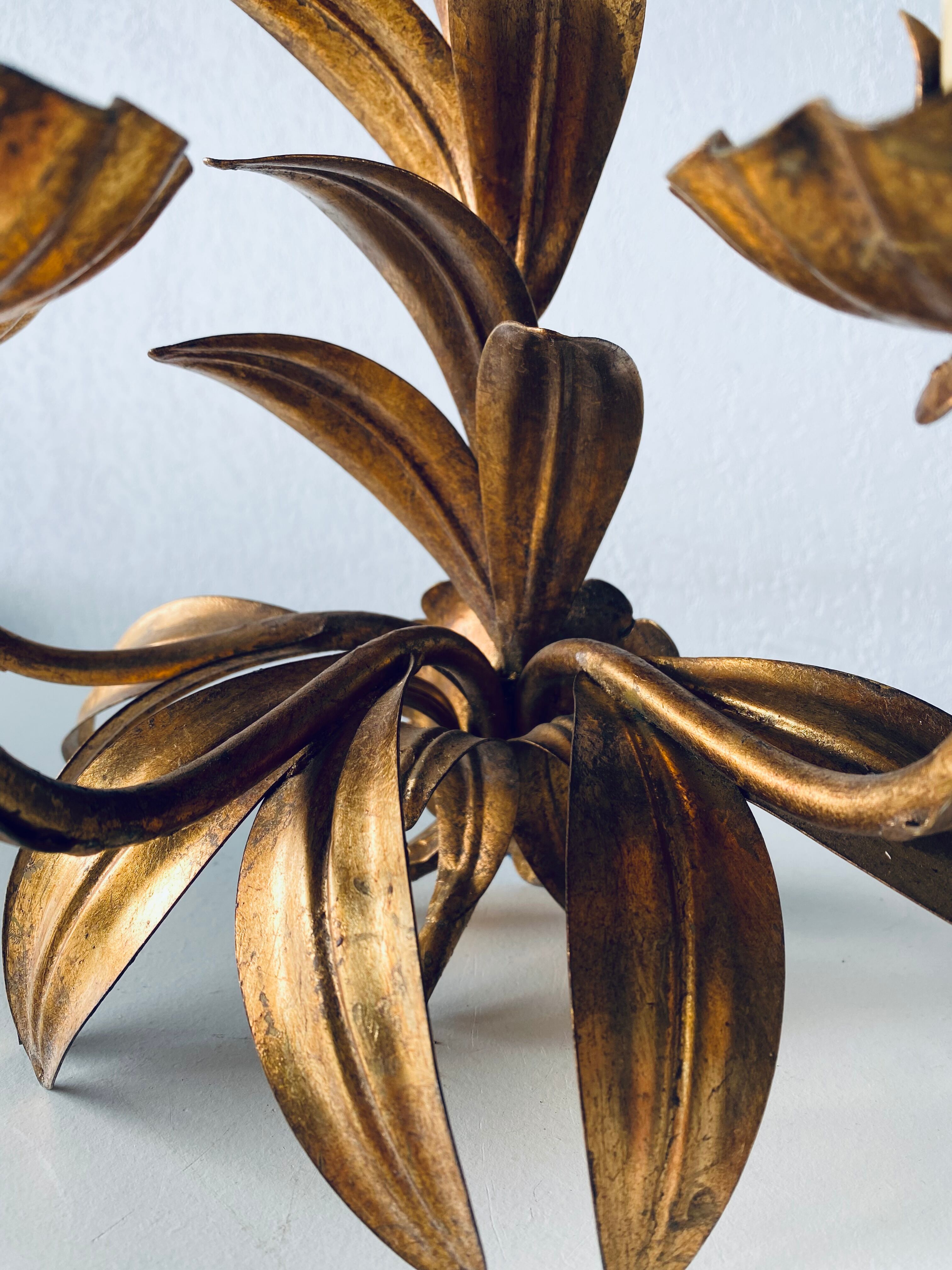 Golden leaf wall light