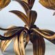 Golden leaf wall light