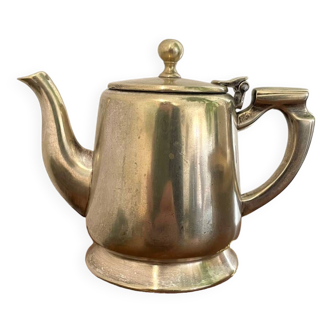 Small silver metal teapot