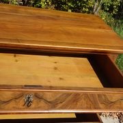 Walnut and walnut burl commode in Louis Philippe style.