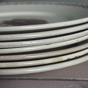 Set of 7 flat plates Badonviller Germaine