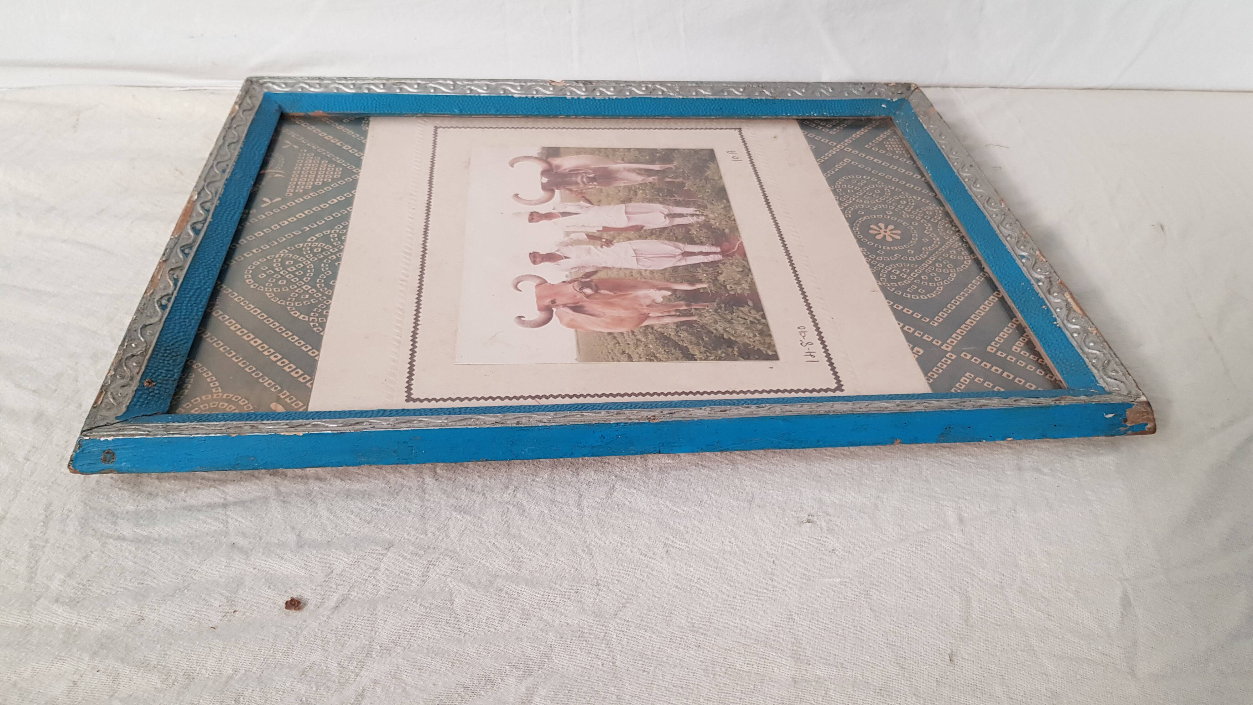 Old kitsch photograph in pretty vintage glass frame