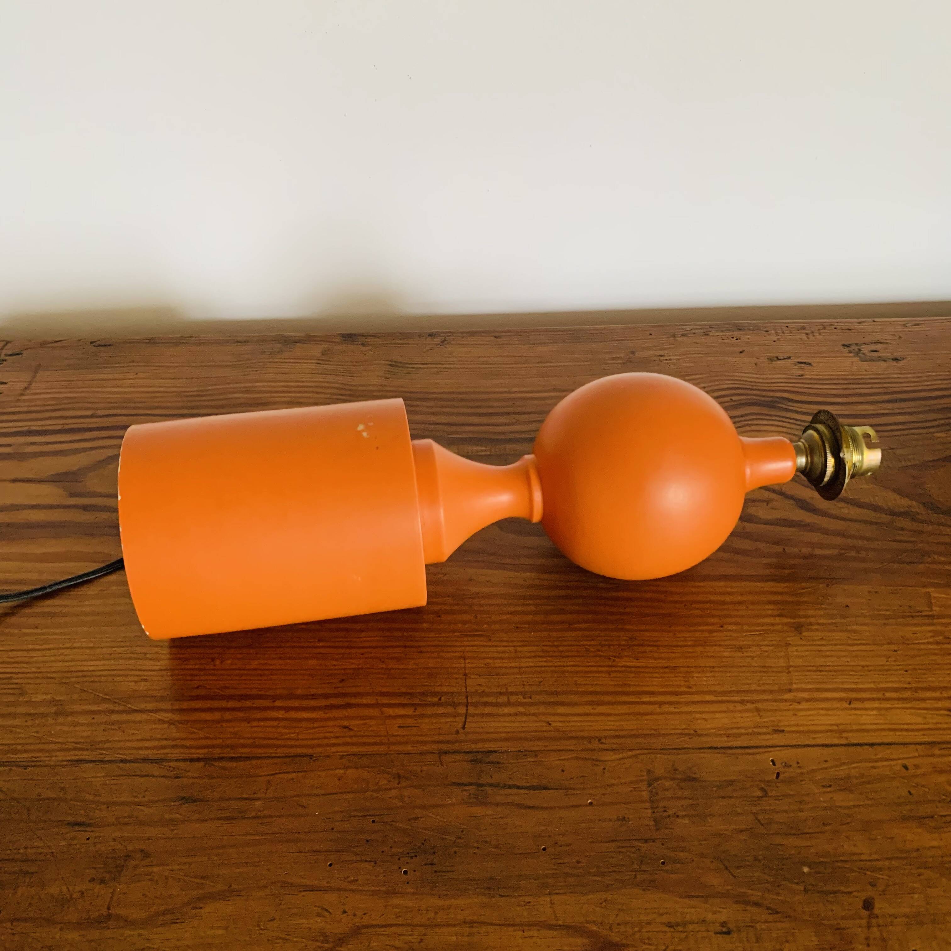 Orange turned wooden lamp base