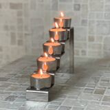 Chrome-plated metal candle holder