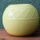 Vase boule jaune, années 50