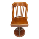 Swivel American chair in walnut and cast iron