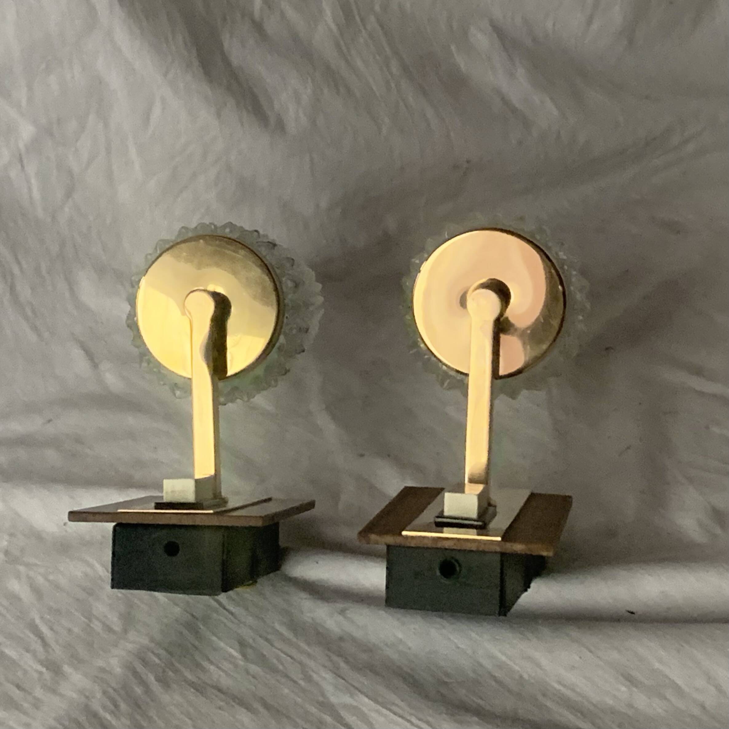 Pair of vintage wall sconces in molded glass and gilded brass