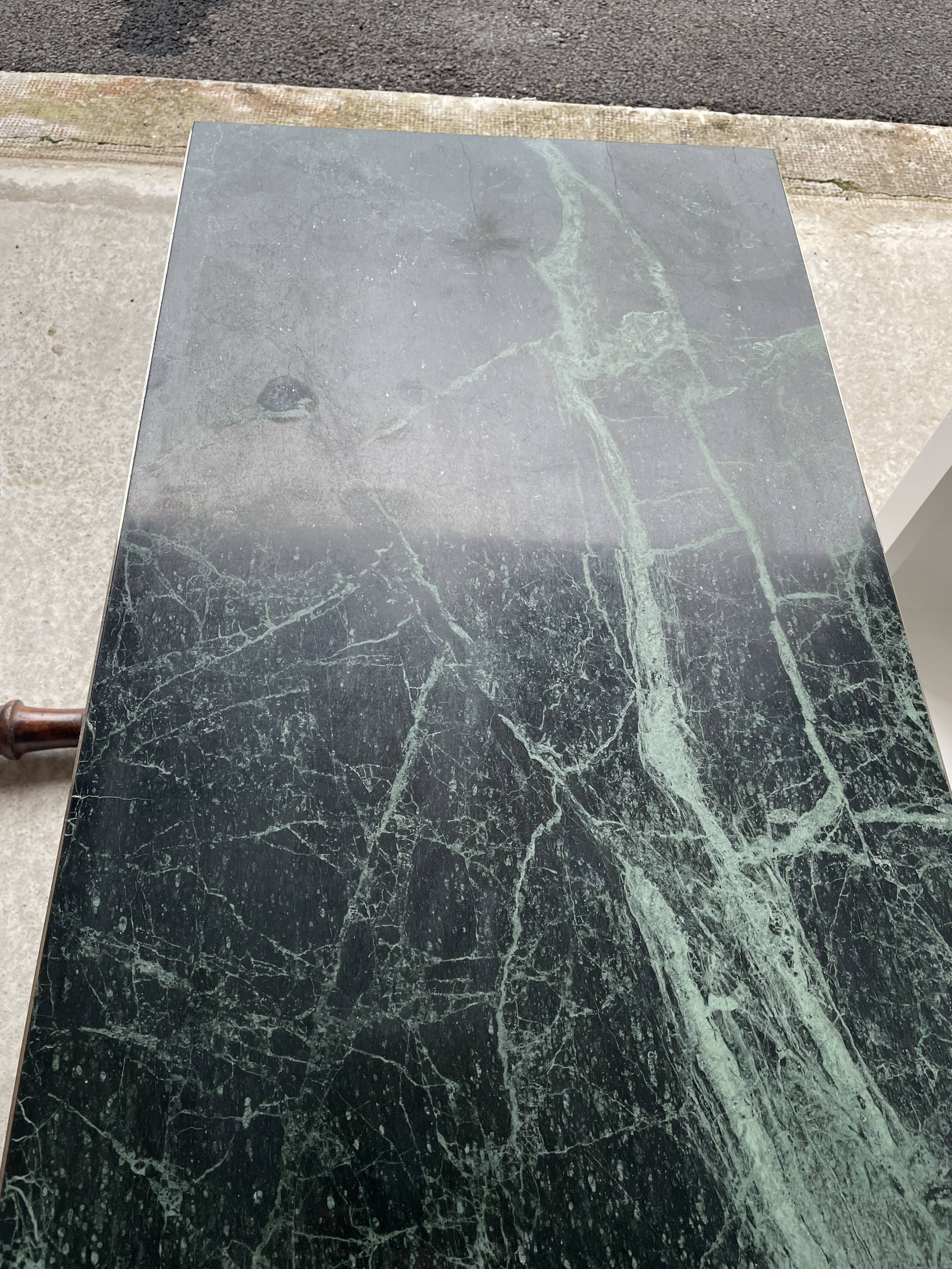Coffee table in gilded brass and veined green marble