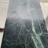 Coffee table in gilded brass and veined green marble