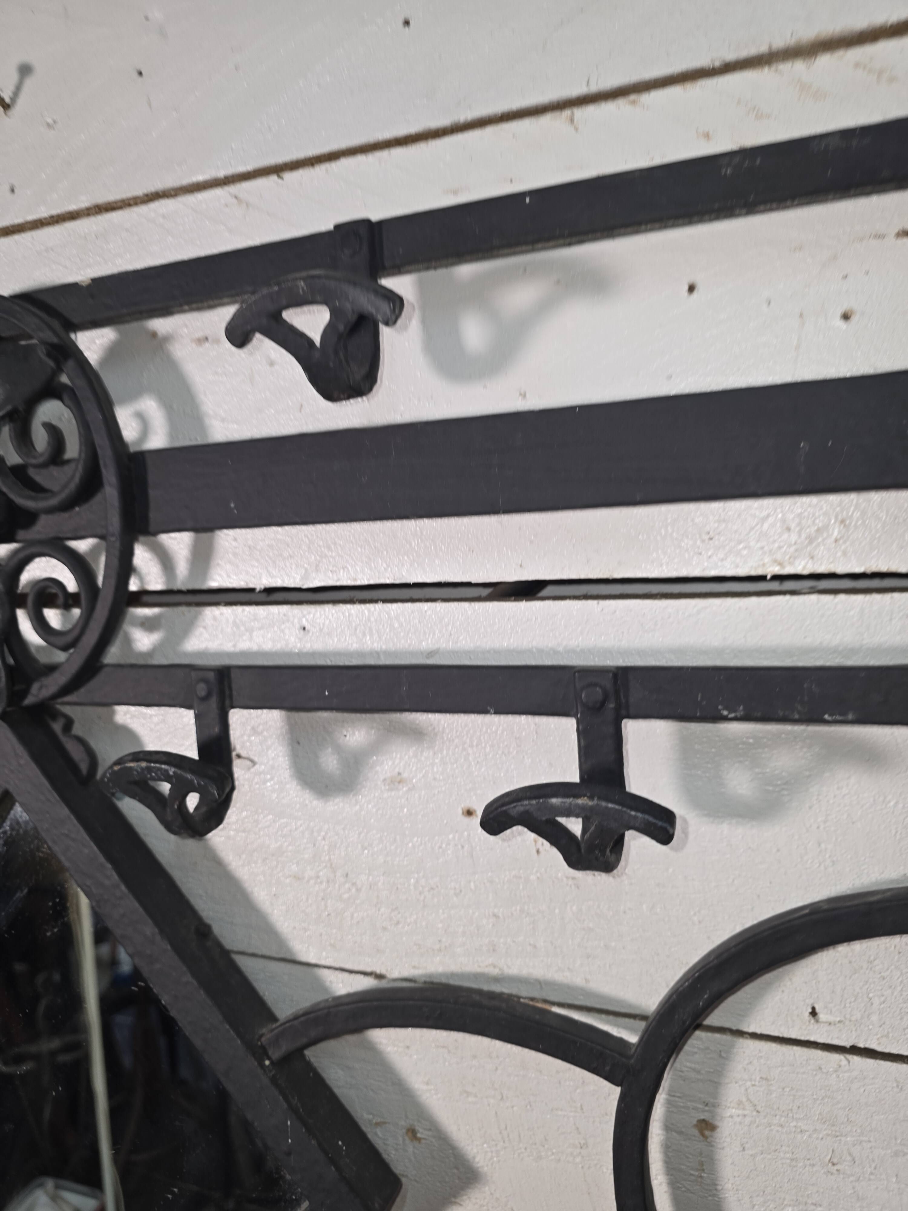 Art Deco coat rack wardrobe in wrought iron from the 1930s.