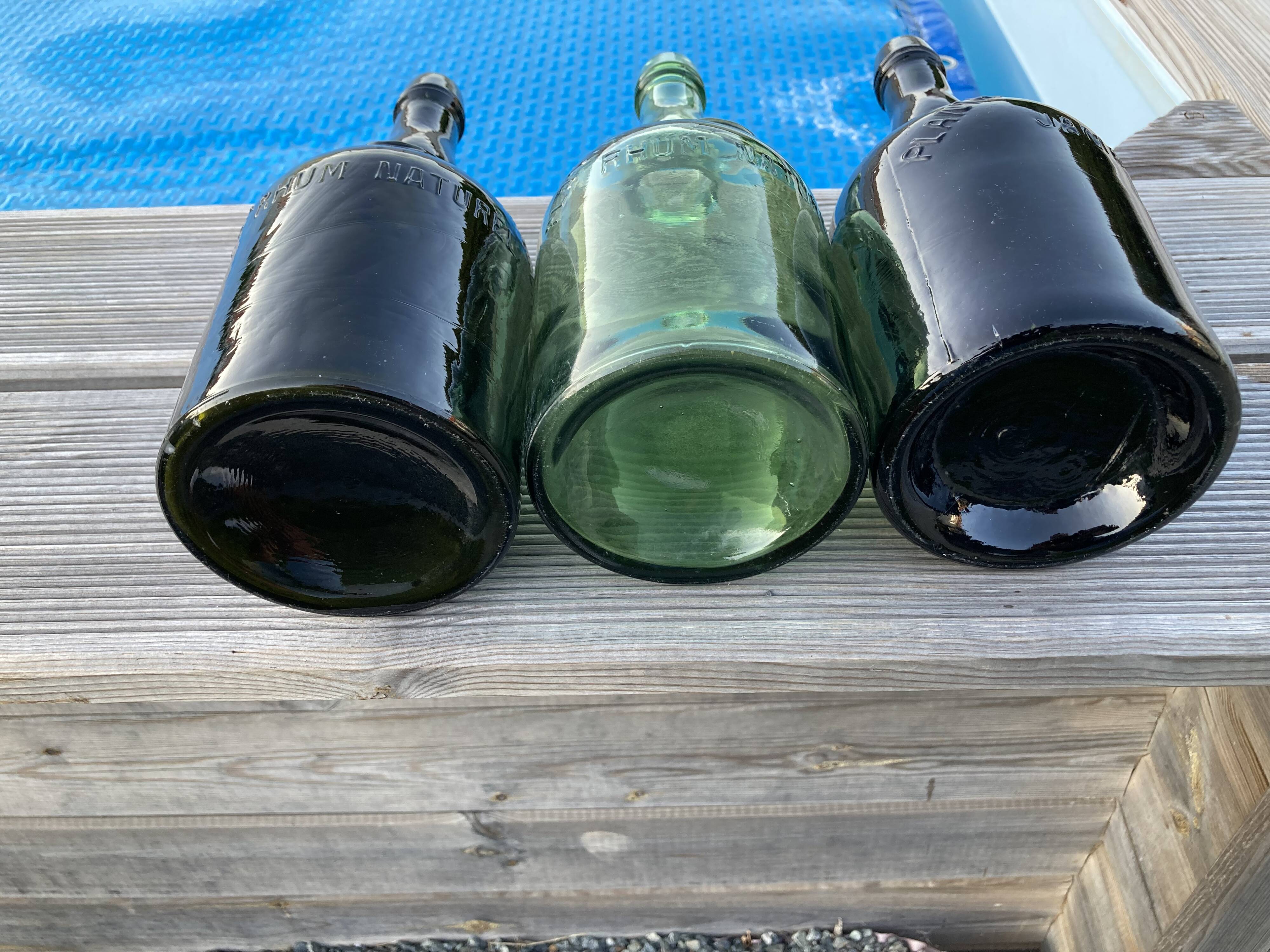 Set of three Vintage Rum Bottles