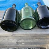 Set of three Vintage Rum Bottles