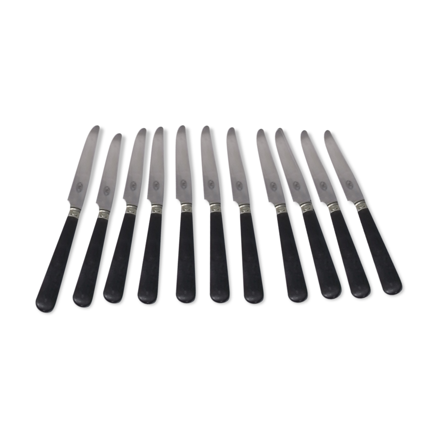 Set of 11 black wooden sleeve knives