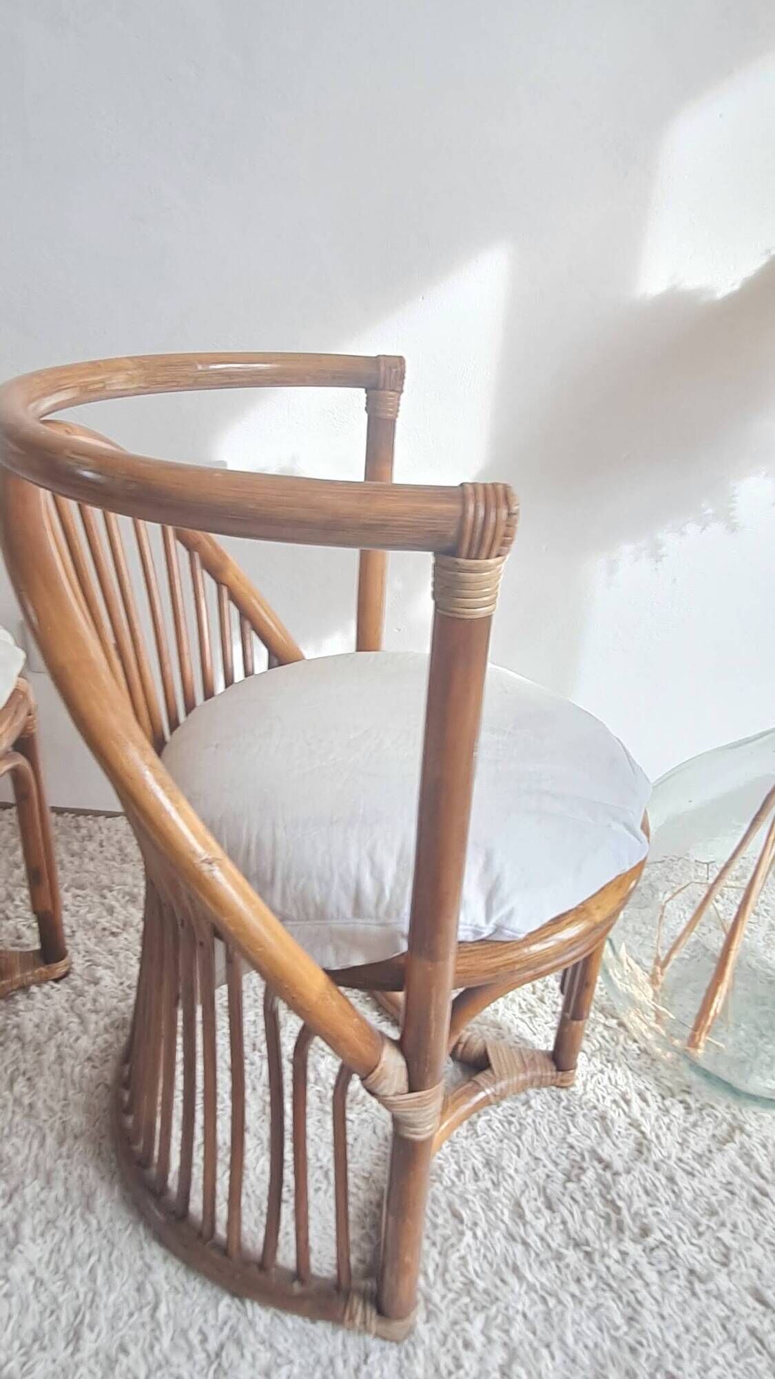 Pair of vintage rattan armchairs circa the 1960s.