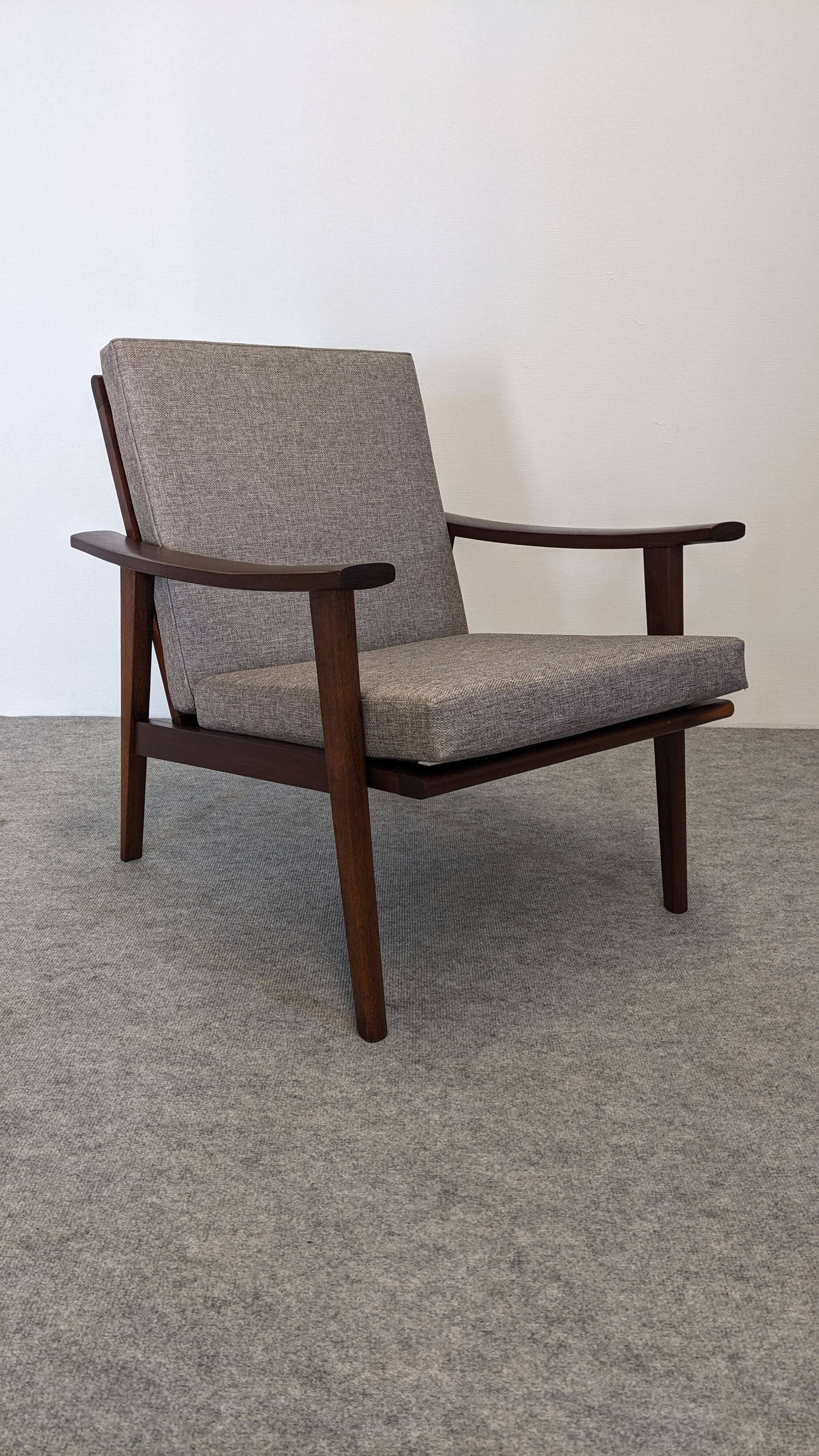 Scandinavian style armchair in teak, Eastern Europe around 1950.