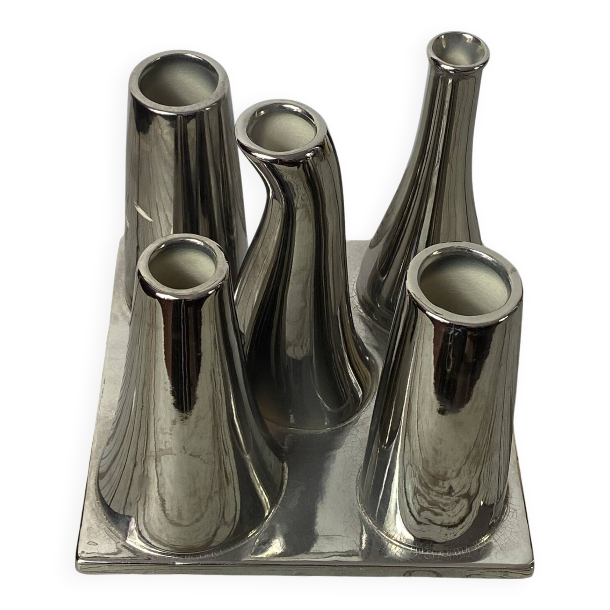 Asymmetrical multitube vase on a base, in silvered ceramic, 1970.