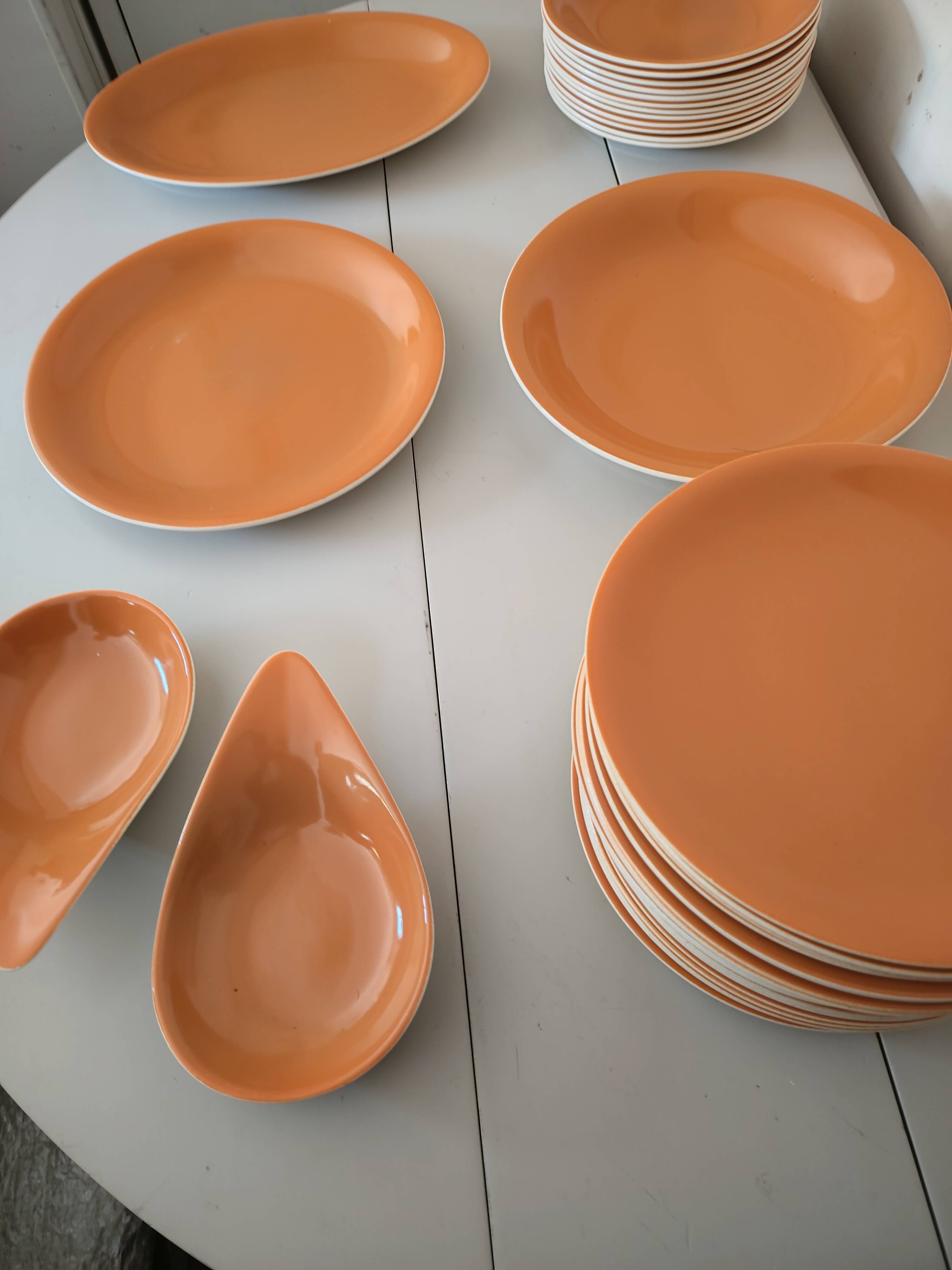 Orange dinner service from Salins