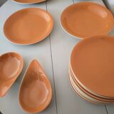 Orange dinner service from Salins