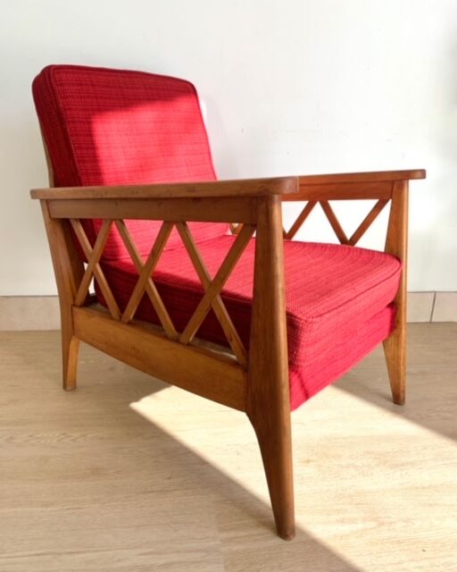 Pair of vintage wooden armchairs with braces