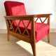 Pair of vintage wooden armchairs with braces