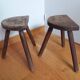 Cowherd tripod stools