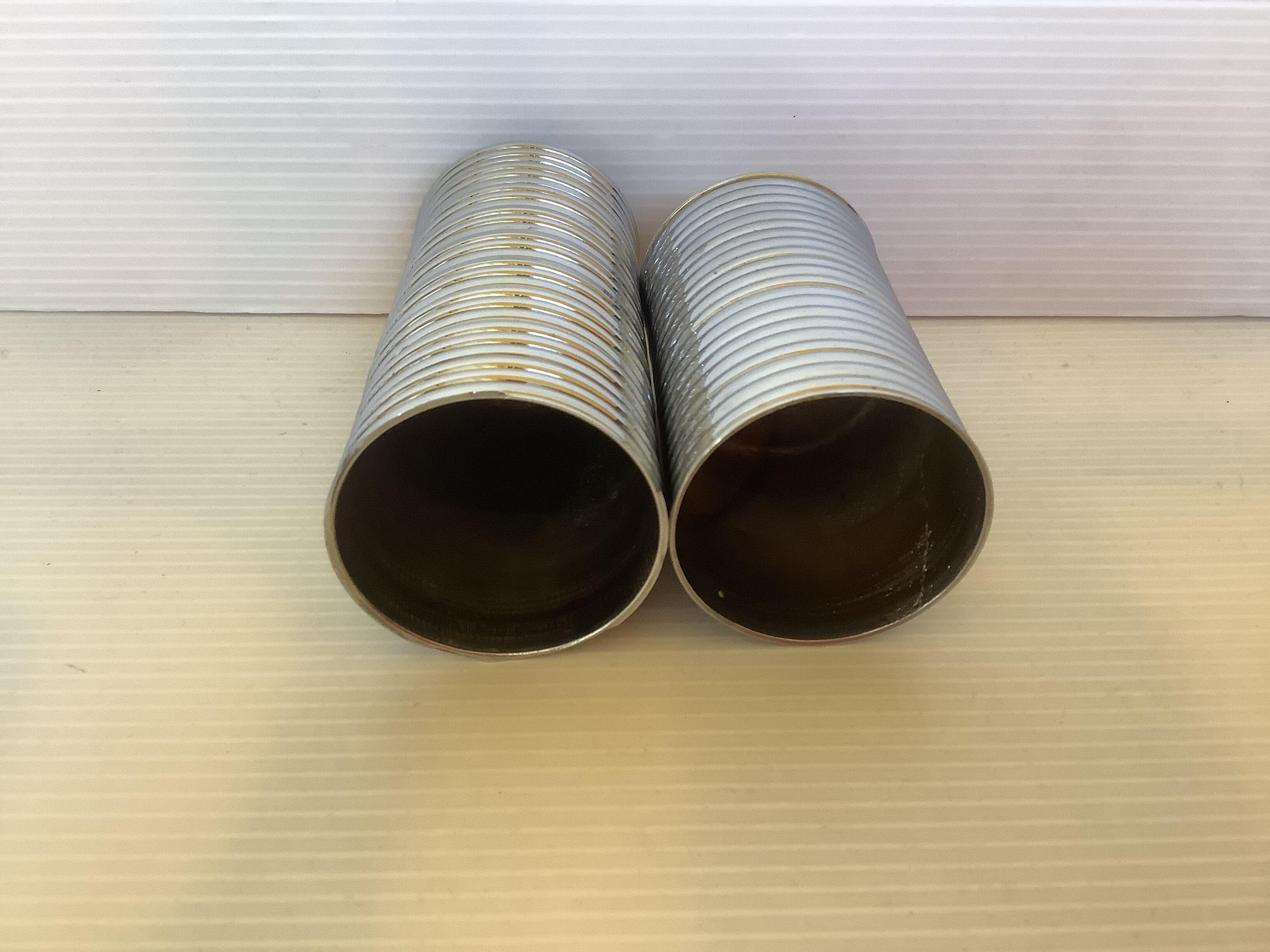 Pair of chrome-plated metal roller holders