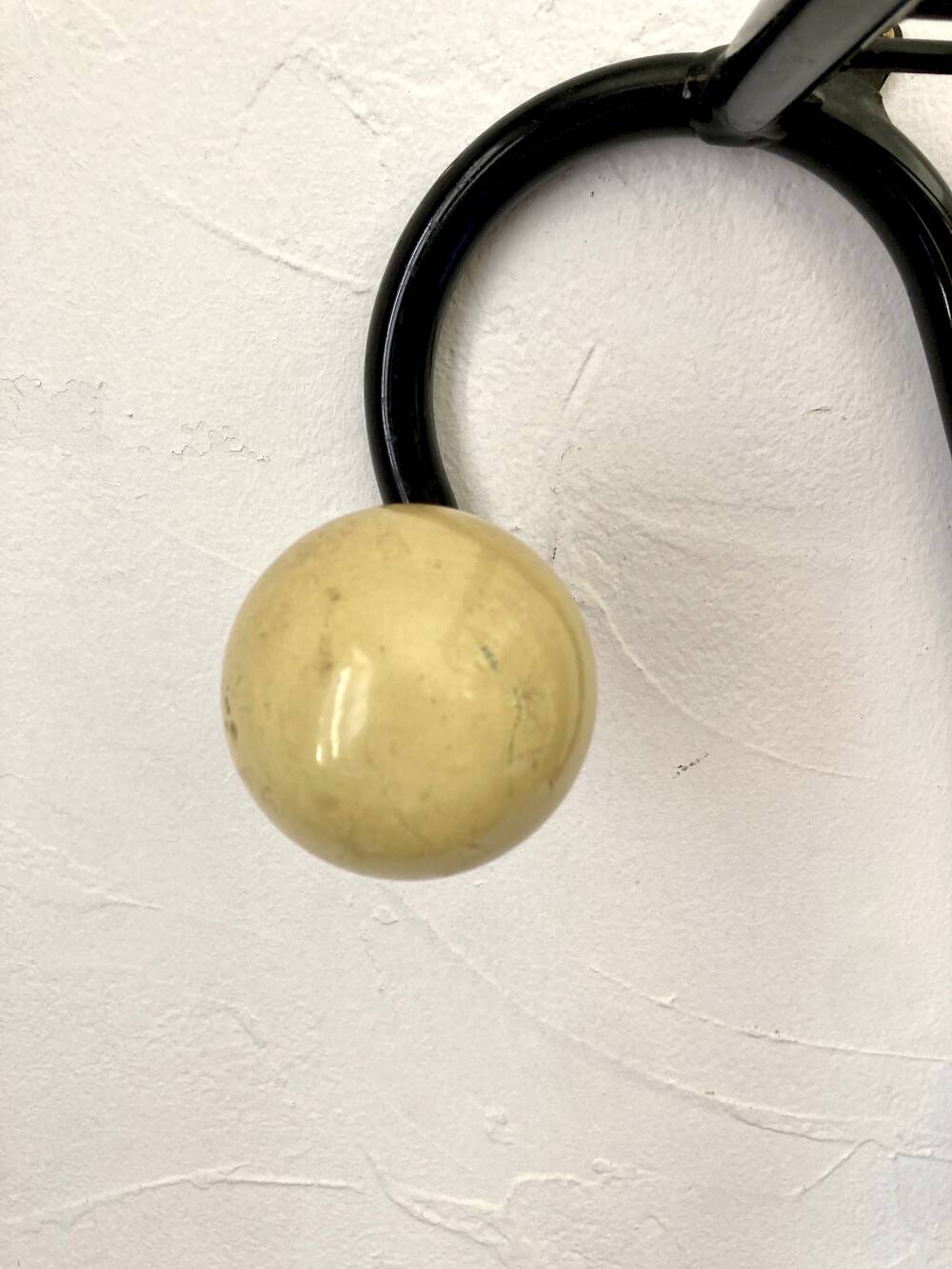 Wall coat rack, 1950s, attributed to Mathieu Matégot.