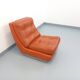 Vintage Roche Bobois armchair in chrome and terracotta leather.