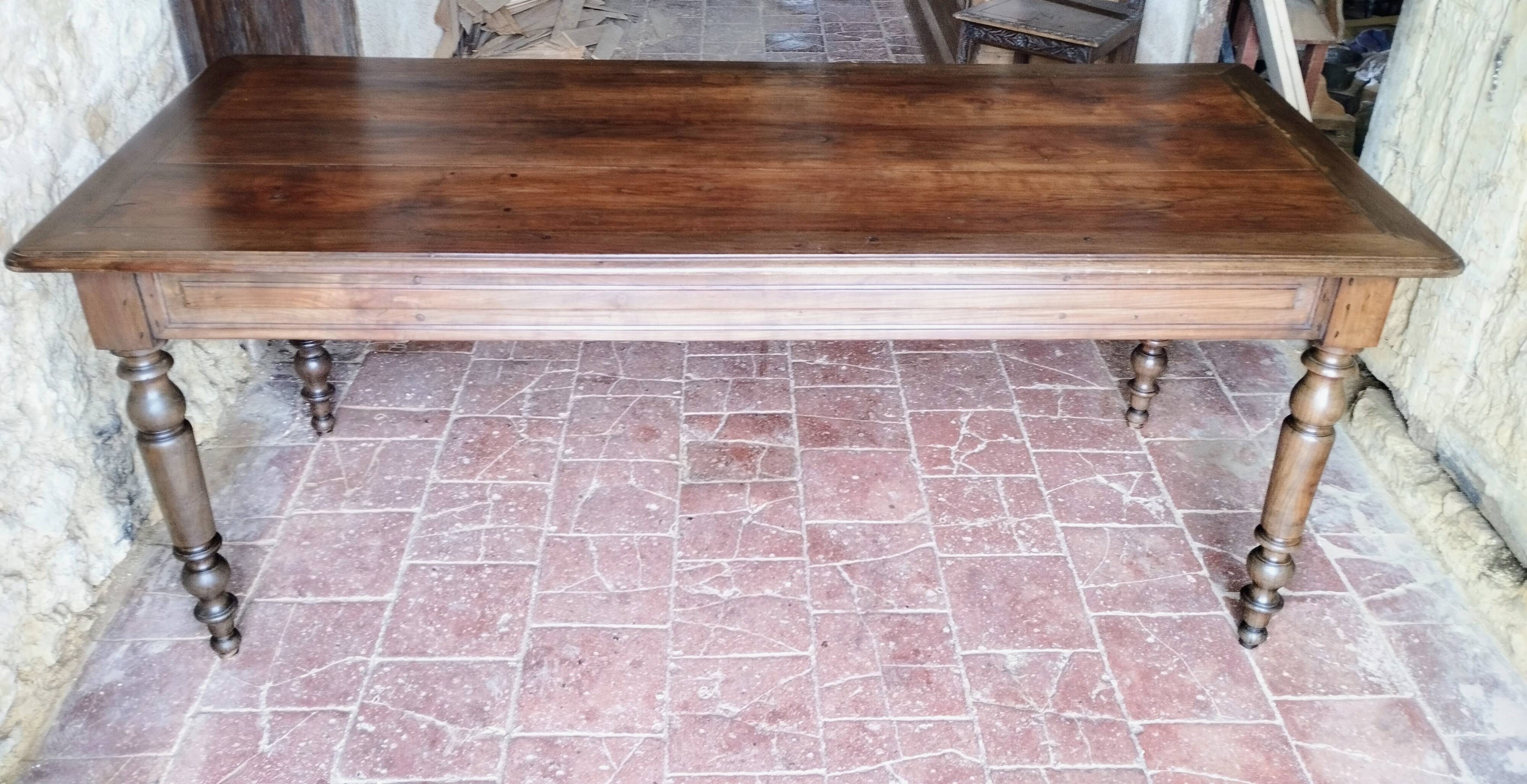 Old French farmhouse table in walnut, turned legs, waxed finish