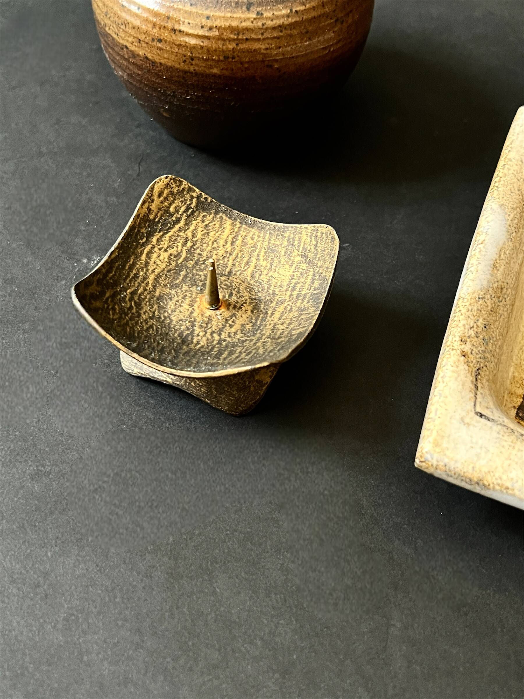 Hammered brass candle holder, brutalist design, 1970s