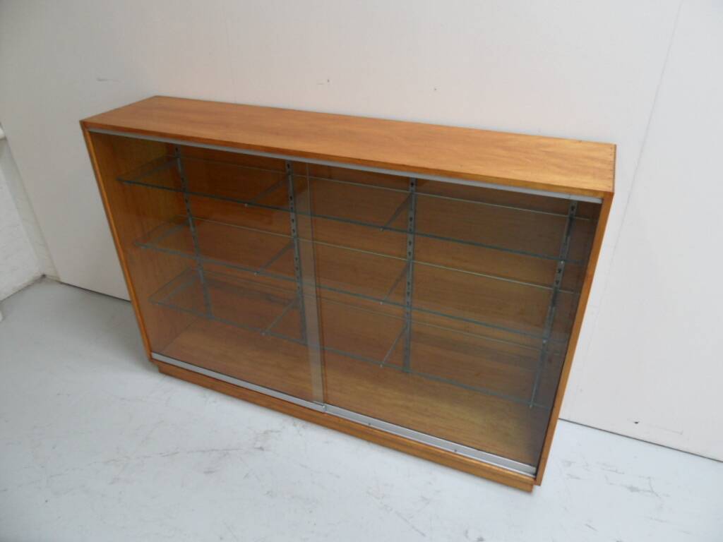 Vintage shop display cabinet with sliding doors