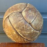 Mid-20th century leather soccer ball with visible stitching and beautiful patina